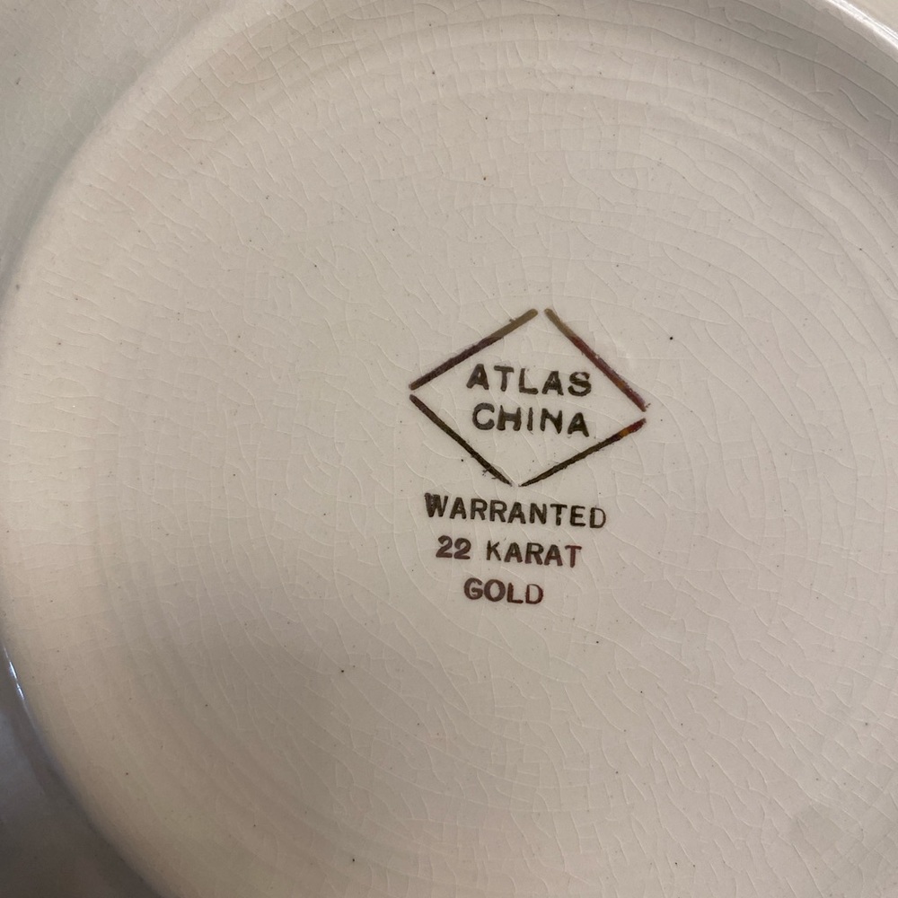 22 carat. Gold trimmed antique small plate set of 8 and a platter.